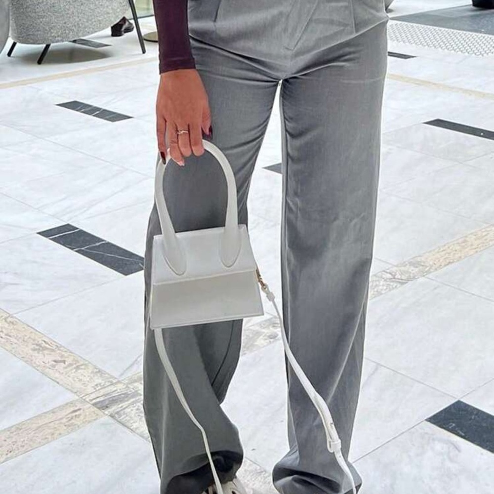 Asymmetrical Waistband Pleated Pants